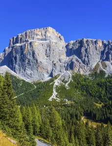 Colossal gray and white rocks against the blue sky