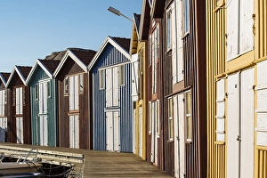 Colourful boathouses in the harbour of Smoegen