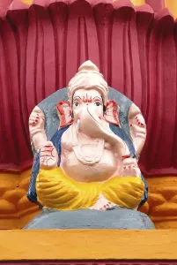 Colourful idol of lord ganesha ganpati in Maruti temple