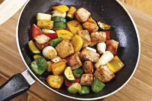 Colourful pan-fried meat with vegetables