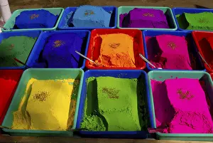 Category Historic EN Prints: Colourful powders used for drawing rangoli kept in plastic container for selling on for Diwali Deepavali festival