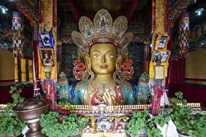 Colourful statue of Maitreya, future Buddha