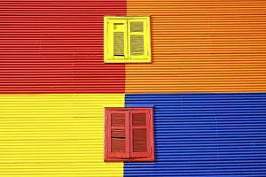 Colourful wall with two windows in La Boca
