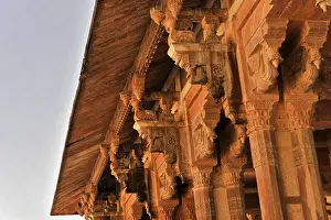 Complex design of architectural ornaments and a stone roof on a historic building