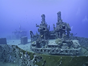 A complex underwater structure reclaimed by nature with visible coral growth: Wreck of the USS Spiegel Grove