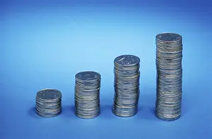 Concept, coins showing growth graph on blue background