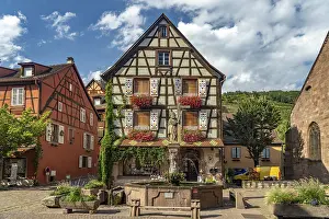 Constantine Fountain and half-timbered houses in Kaysersberg