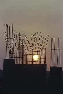Under construction building during sunset