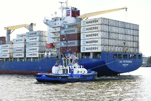 Container ship with stacked containers in the port of Hamburg