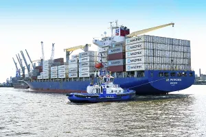 Container ship with stacked containers in the port of Hamburg