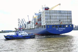 Container ship with stacked containers in the port of Hamburg
