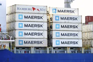 Container ship with stacked containers in the port of Hamburg