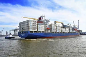 Container ship with stacked containers in the port of Hamburg