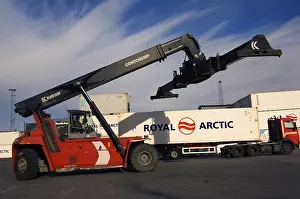 Containers being loaded at the port