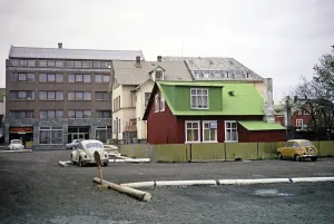 Contrast between historic buildings made of corrugated iron and modern buildings, Reykjavik, Iceland 1972