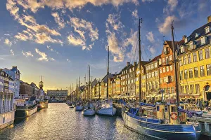 Copenhagen Denmark, sunset city skyline at Nyhavn harbour with colourful house