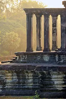 Corridor of pillars in temple ruins. Angkor wat