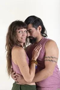 A couple is embracing each other