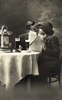 Couple kissing in a pub, newspaper as privacy