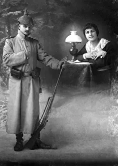 Couple, picture of longing, the beloved misses the man who is a soldier at the front
