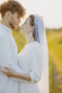 A couple shares a warm embrace