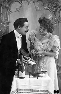 Couples, flirt, woman has cooked for her lover and serves him the food