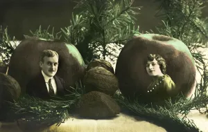 Couples, man and woman each mounted in an apple