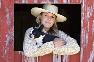 Cowgirl with dog, Oregon, USA