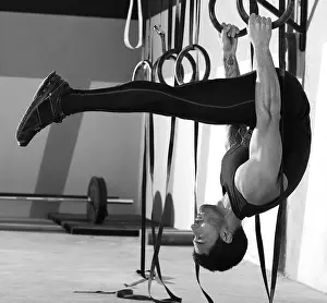 Crossfit dip ring man workout at gym dipping exercise