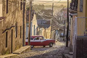 Cuban street with oldtimer in Trinidad, Cuba