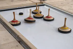 Curling on an artificial ice rink at a Christmas market