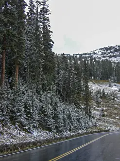 A curved street in the winter in the rocky mountains