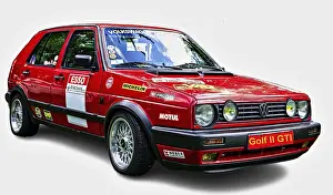 Customized red Volkswagen Golf II GTI posing on a white background