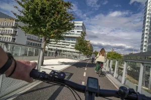 Cycling over the Moreelsebrug, pedestrian and cyclist bridge over the tracks of Utrecht Centraal