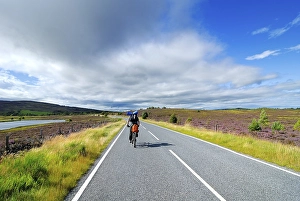 Cyclist in the Grampian Mountains