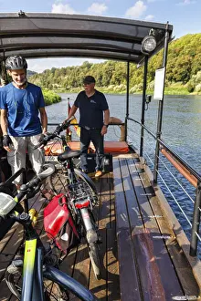 Cyclists on Gravena solar ferry