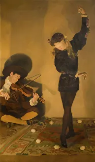 A dancer dances to the sounds of a violinist between eggs in a warmly lit