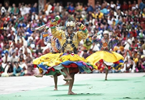 Dancers and spectators at the Tashichho Dzong monastery festival