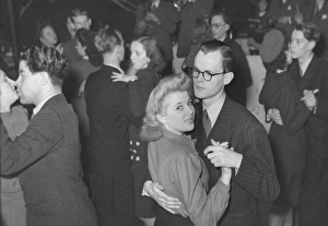 Dancing in the 1940s. The dance floor is filled with well dressed dancing couples