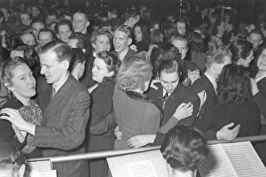 Dancing in the 1940s. The dance floor is filled with well dressed dancing couples
