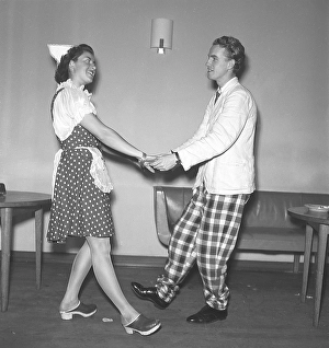 Dancing in the 1940s. A young couple at the theatre dancing together in their stage costumes