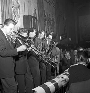 Dancing in the 1950s. The dance floor is filled with dancing couples moving to the music