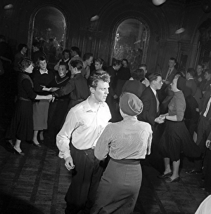 Dancing in the 1950s. The dance floor is filled with dancing couples moving to the music. Sweden 1953. Ref 2363