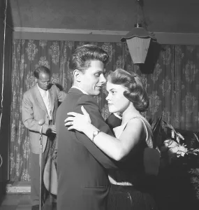 Dancing in the 1950s. A young couple is dancing