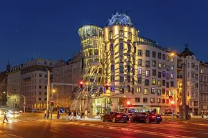 The Dancing House of architects Vlado Milunić and Frank Gehry at dusk