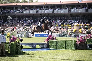 Category Historic EN Prints: Daniel Coyle of Ireland and riding Legacy compete in the first round of the 1