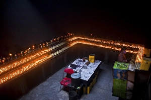 Dark room with many prayer candles in Ramoche Temple