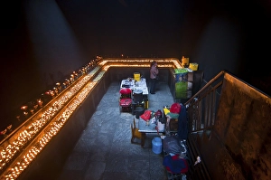Dark room with many prayer candles in Ramoche Temple