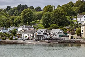 DARTMOUTH, DEVON, UK - JULY 29 : View across the River Dart towards the Floating Bridge pub in Dartmouth