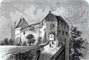 Das Tor der Wartburg ueber der Stadt Eisenach in Thueringen